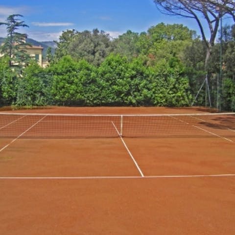 Get the rallies going on the clay tennis court