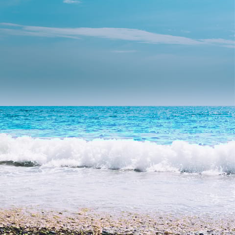 Spend an afternoon at Paralia Glifoneri, also a ten-minute drive from your door