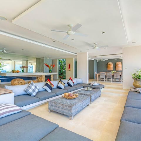 Entertain in style and enjoy a Mai-Tai on the wrap-around couch