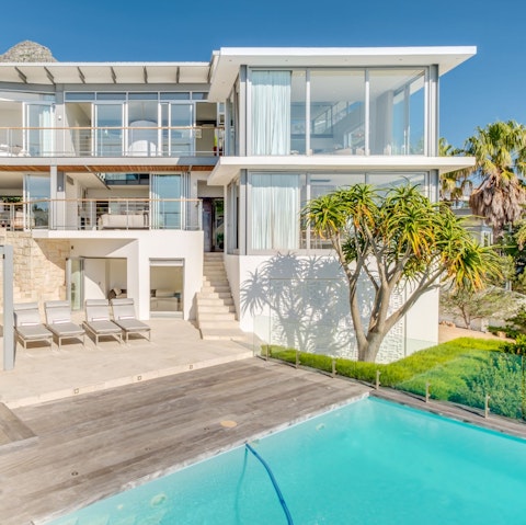 Enjoy relaxing days by the pool or make the short drive to the beach