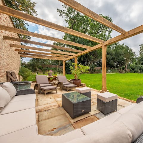 Pour a glass of wine to enjoy out in the garden with a cheese platter