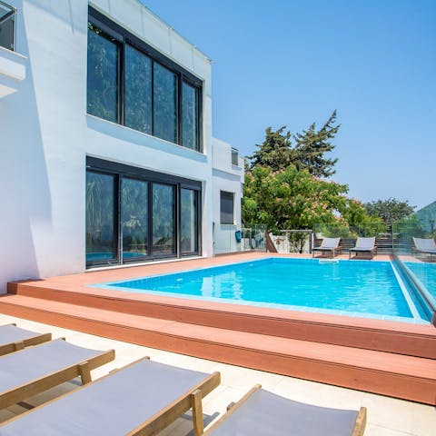 Swim and sunbathe in the glorious Green sunshine