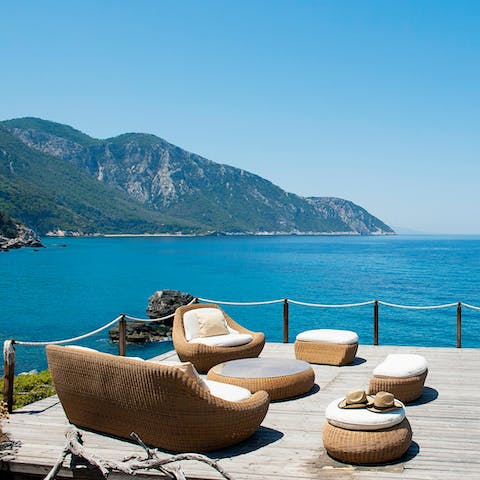 Kick back and relax on the outdoor sofa with a good book