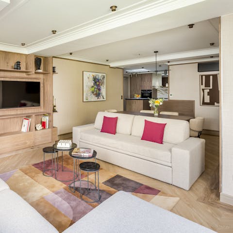Enjoy a glass of Champagne in the living room after exploring the City of Light