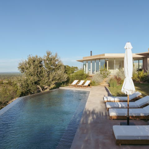 Savour total relaxation while lounging by the pool