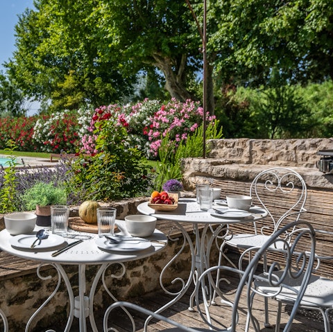 Dine alfresco in the pretty garden