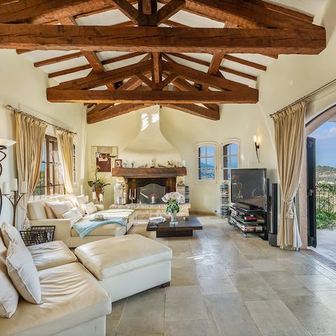 Sink into the deep leather sofas and settle in for a movie night by the fire