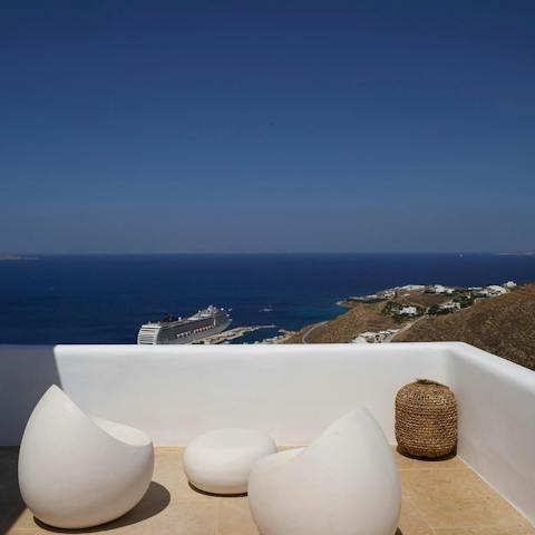Admire the sea views with a cool drink on the balcony