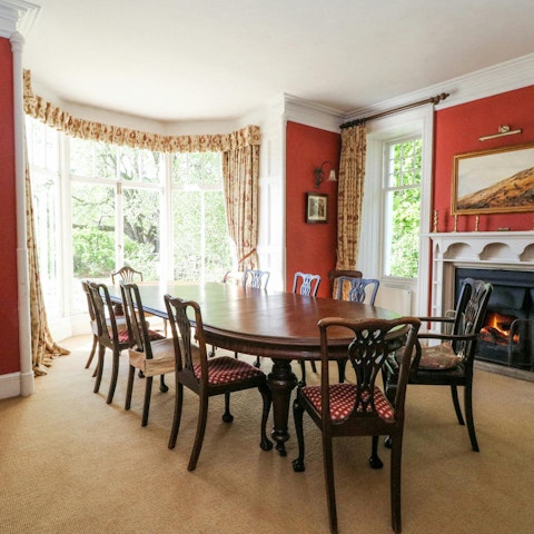 Host meals in the dining room, with its cosy open fire