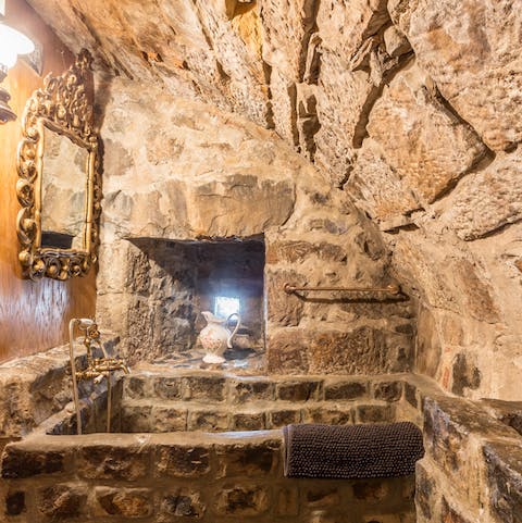Soak in a Medieval-style bathtub