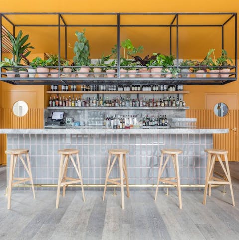 Sip cocktails and meet the neighbours in the communal bar