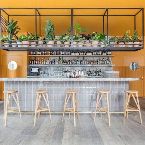 Sip cocktails and meet the neighbours in the communal bar