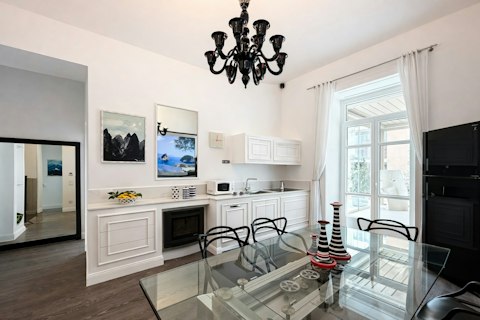 Gather around the dining table for a sociable meal