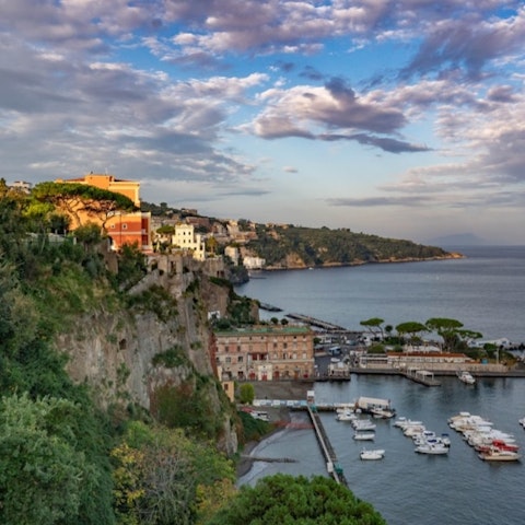 Stroll down to Sorrento's colourful harbour, easily reached on foot