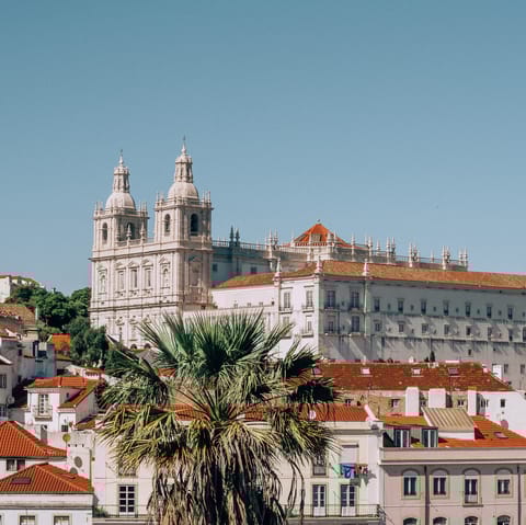 Explore the historic streets of Lisbon's Alfama district