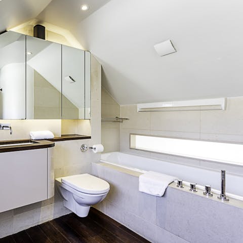 Sink into a relaxing bath in the top-floor en-suite bathroom
