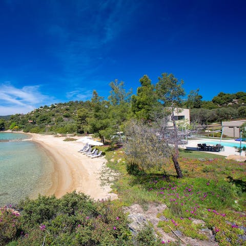 Enjoy direct access to your private beach, where you can sail out and start an adventure