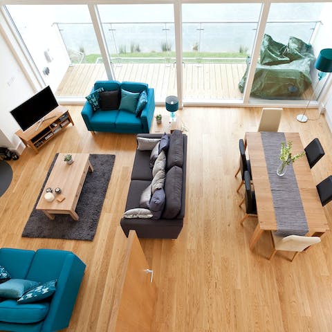 Enjoy the light flooding into this stylish home