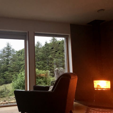Curl up around the cosy log burner after exploring the Isle of Skye