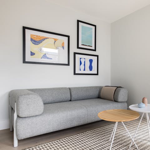 Curl up in front of Netflix on the grey sofa