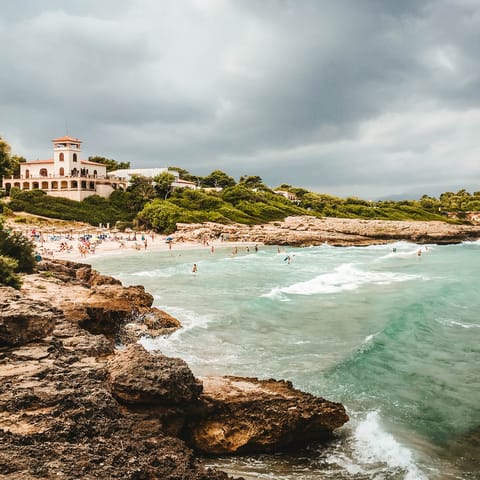 Catch some rays at Alcudia beach – a fifteen minute drive away