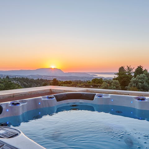 Watch the sunset from the jacuzzi
