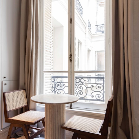 Enjoy breakfast by the window in your typically Parisian home-from-home