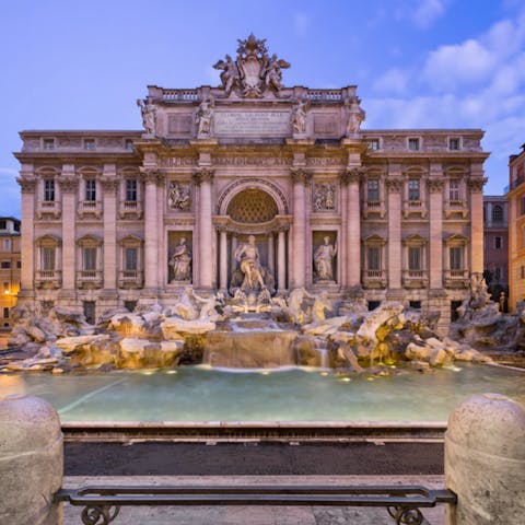 Toss a coin in the incredible Trevi Fountain, just a minute from your door