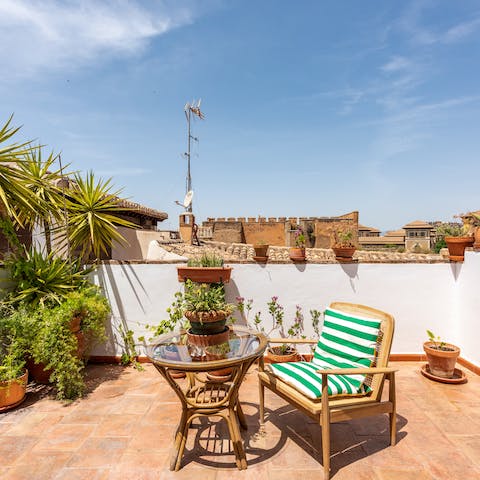 Savour your morning coffee on the terrace, which offers views over the city rooftops