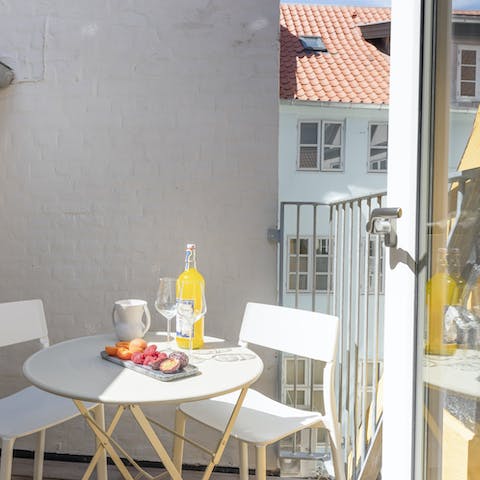 Toast the day's end with drinks on the suntrap terrace