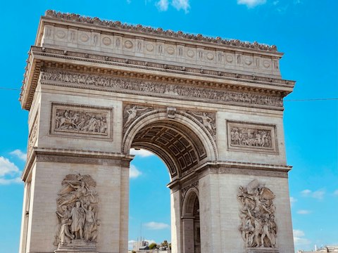 Climb the Arc de Triomphe for panoramic views across Paris, just twelve minutes on foot