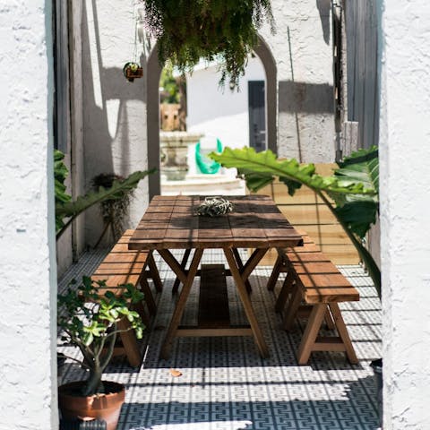 Dine alfresco on custom cedar picnic tables