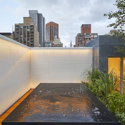 Catch a glimpse of the Empire State Building from your rooftop