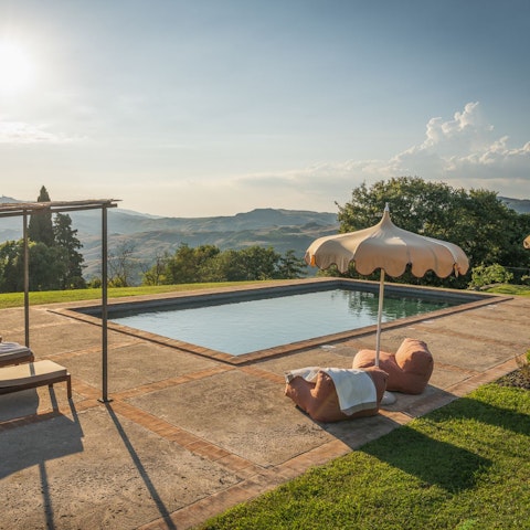 Relax poolside with stunning views of the countryside