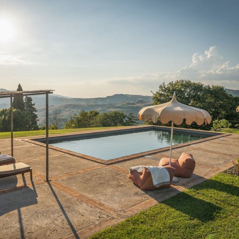 Relax poolside with stunning views of the countryside