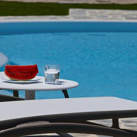 Paddle about in the swimming pool and dry off naturally under the glare of the sun