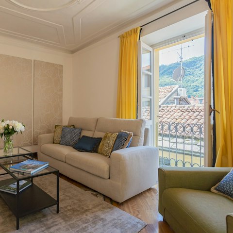 Open up the French doors and admire the vistas over the terracotta rooftops to Lake Como's wooded hills