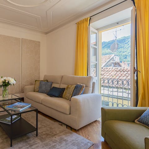 Open up the French doors and admire the vistas over the terracotta rooftops to Lake Como's wooded hills