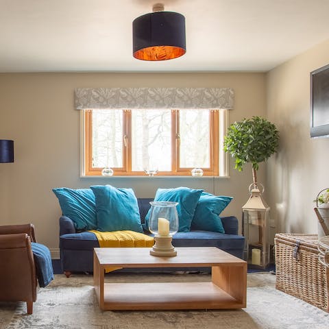 Sink into the sofa with a good book for a relaxing evening in
