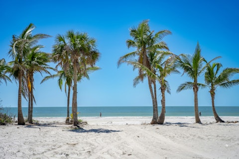 Soak up the sunshine on Naples Beach, a fifteen-minute drive away