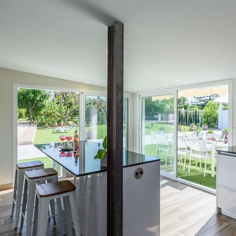 Sip sangria and nibble on olives around the kitchen island