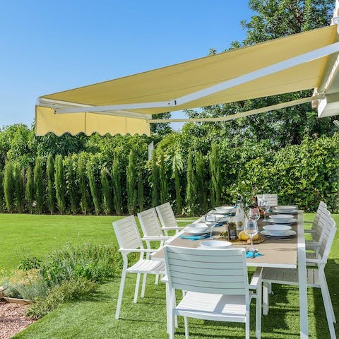 Share an alfresco tapas feast under the shade of the awning