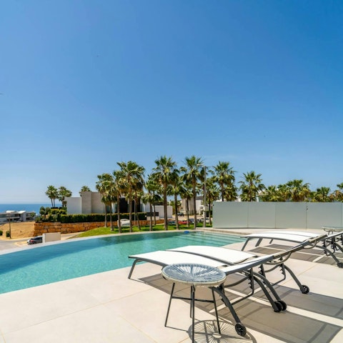 Relax by the private pool or head to the beach
