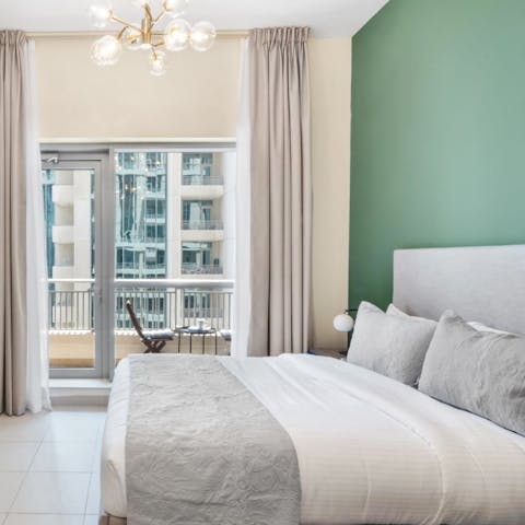 Draw the blackout curtains and bank a dreamy night's sleep in the king-sized bed