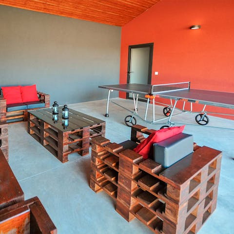 Have a family ping going tournament, or kick back and relax on the sofas