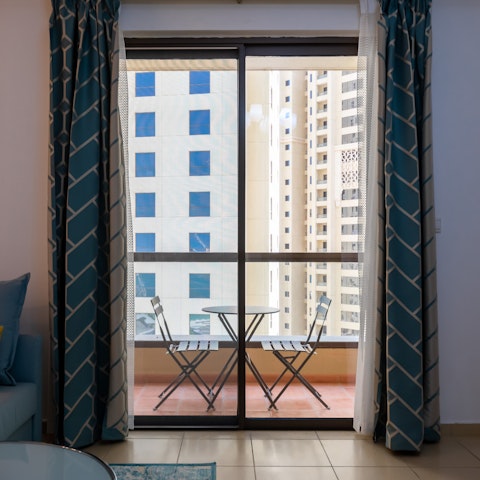 Take your morning coffee out on the balcony off the living room