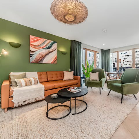 Spend your downtime reading in the green-hued living space