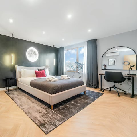 Enjoy a spot of stargazing in the moon-themed bedroom