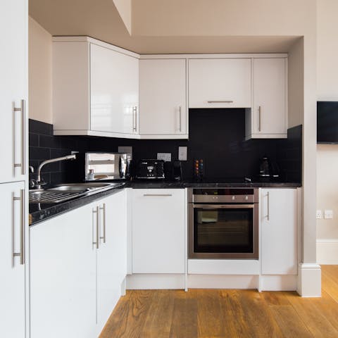 Cook light meals in the modern kitchenette