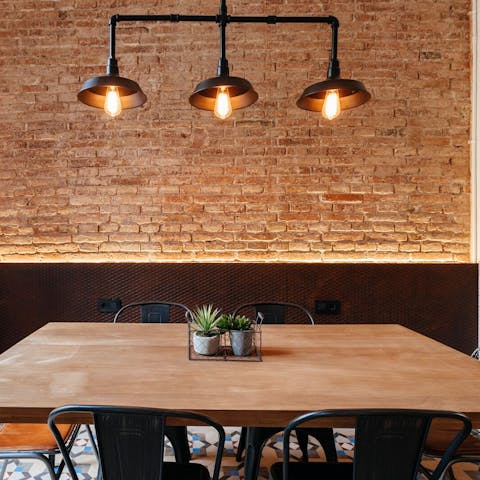 Cook up some Catalan cuisine and enjoy around the super-stylish dining table